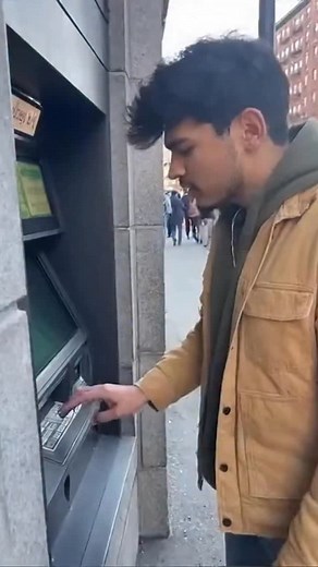 20K views · 55 reactions | He just wanted cash… ATM said “take it ALL!” This guy casually withdraws money — and suddenly the ATM glitches and starts spitting bills like a money cannon. He freezes. Doesn’t know if it’s a blessing or a crime scene. The jackpot no one expected 藍 #wow #ai #fail #really #crash #atm #money #lucky #unexpected #viralclip #funny #what #shit #no #bank | The.worldai | Facebook