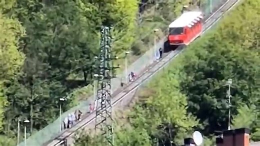 Passengers forced to walk down tracks as power outage halts tram in Spain