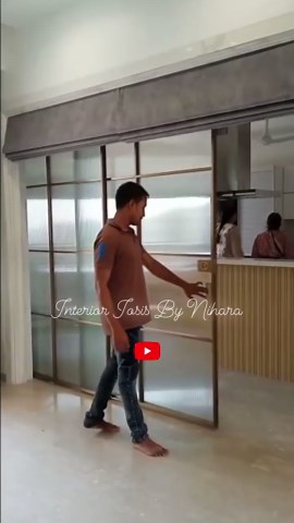 Interior Iosis by Nihara ♥️ on Instagram: "#cnr Sliding Synchronised partition ♥️ acts as a room divider 🔥Between the kitchen and son’s bedroom / Living room , is worth it’s costing of 200k in this #luxuryinteriors of #3bhk . With @swapnil_iosis & @nikhilgharat16 . . . . #roomdivider #slidingdoors #slidingpanels #flutedglass #fluted #interiordesign #3bhkflats #interiordesign #luxurylifestyle #luxuryhouse #luxuryhomes #interioriosisbynihara #iosisarchitects"