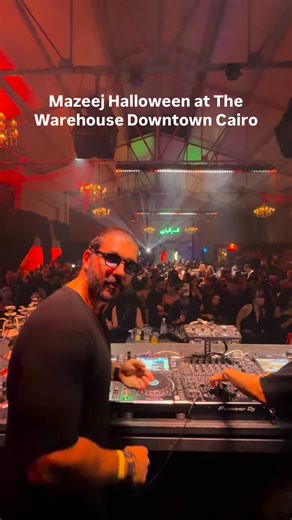 KZ & Cake Take Over The Warehouse Tonight Live now from Downtown Cairo, KZ and Cake are taking control of The Warehouse for the second act of Mazeej Balad’s Into the Shadows. The room is packed, the lights are red, and the atmosphere is electric as the duo delivers a Halloween set filled with dark basslines and hypnotic energy. The night marks one of Cairo’s most striking Halloween takeovers yet, blurring music, art, and theatrics into one spectacular night. Follow @cairospots, visit our website