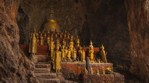 Inside Laos' hidden cave of Buddhas