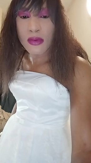 Elegant Wedding Gown Showcase in a Bedroom Setting