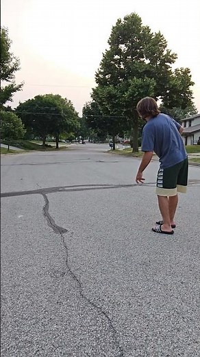 father and son disc golf practice