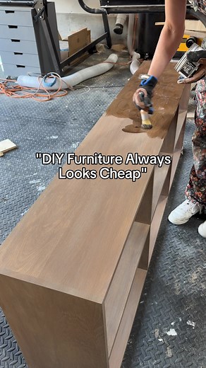 DIY furniture doesn’t have to be hard to build to look expensive. We needed storage in our living room so I built this super easy sofa table. How do you think it turned out? Let me know if you want the plans in the comments!
