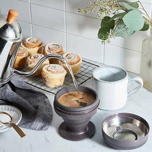 This collapsible little caffeine factory has a reusable filter so all you need are grinds, hot water, and a mug. Three minutes later…good morning! Or afternoon. Whenever. | Food52