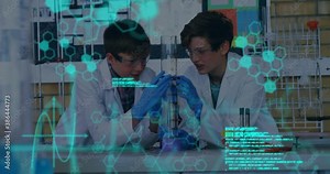 Medical data processing against two male students experimenting in laboratory