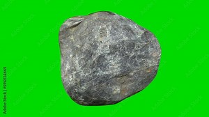 Animated 3d stones on a green background. Stone throwing video effects. 3d rendering. 4k Stock Video