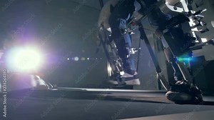 Physically challenged person is walking with the help of a track simulator. innovative robotic VR cybernetic system.