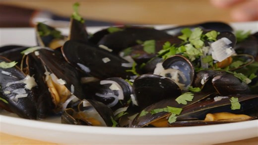 Chai-steamed mussels with butter, lime, and coriander