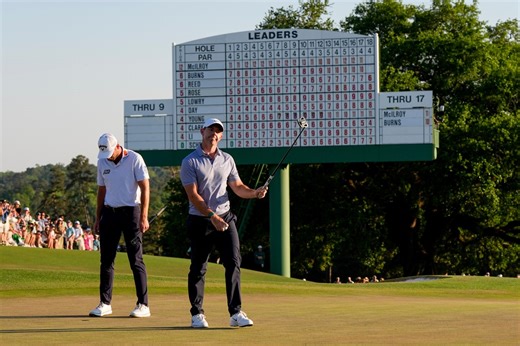The Latest: Leaders tee off at the final round of the Masters