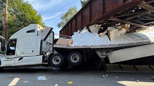 'Boom': Tractor-trailer crashes into low bridge in Westbrook
