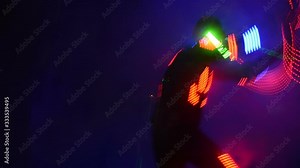 Laser show performance, dancers in suits with LED lamp, very beautiful night club party.