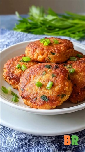 Classic Southern Fried Salmon Patties Crisp on the exterior and tender within, these Southern-style salmon patties showcase flaky fish bound with savory aromatics and a light cornmeal crust. The shallow-frying technique delivers a golden finish while preserving moisture and structure at the center. 🛒Ingredients : 1 can salmon, drained 1/4 cup onion, finely chopped 1/4 cup all purpose flour 1/4 cup cornmeal 1 large egg 3 tablespoons mayonnaise Oil for cooking Salt and freshly ground black pepper