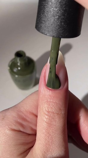 Festive yet timeless 💚 Suzi - The First Lady of Nails is a deeeep olive green that sleighs in every season. 🎄🍸 | OPI