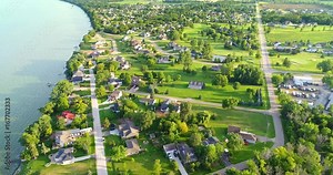 Beautiful neighborhoods on shore of big lake, aerial view