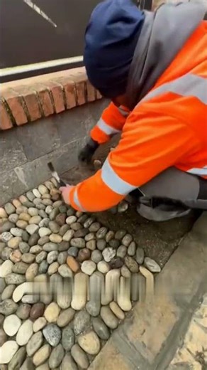 The whole process of paving a cobblestone road
