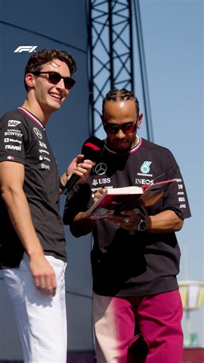 1.2M views · 22K reactions | George has brought THE book... Worth the 15 year wait! 凉 ✍️ #F1 #Formula1 #AbuDhabiGP | F1 | Facebook