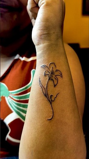 🌸✨ Grace in Every Petal. Strength in Every Bloom. ✨🌸 | #LilyTattoo #flowertattoo