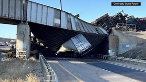 Colorado’s I-25 is partially closed after a coal train derailed off a bridge and killed a semi-truck driver, authorities say - WSVN 7News | Miami News, Weather, Sports | Fort Lauderdale