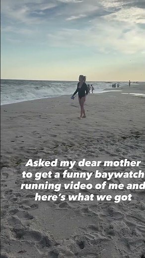 Amy Schumer boogie boarding at the beach