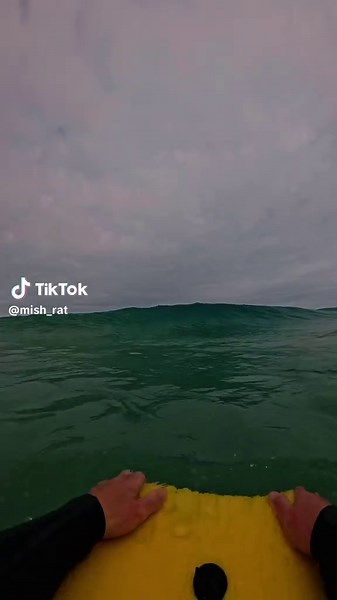 Caught Off Guard While Bodyboarding at the Beach