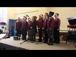 Children's choir singing Away In A Manger