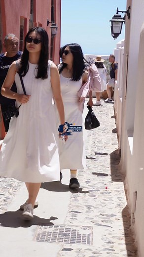 Sunshine, smiles, and the stunning streets of Santorini! Every step a joyful discovery in this beautiful paradise | Visuals By Saqlain