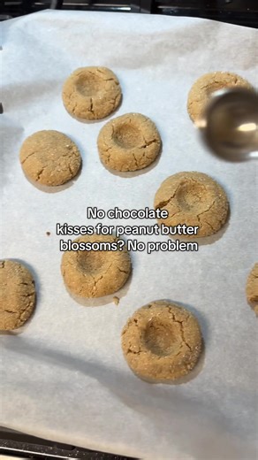 Melted chocolate for the win! So excited for these peanut butter blossoms! I’ve never made them before and these are vegan from Nora Cooks website. #hack #backing