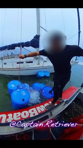 Heeling a 50’ Ketch sailboat blown into shallow water with some strong winds! Owner tried to heel it with barrels of water for leverage, but it wasn’t quite enough. #captainretriever #sailboat #salvage #rescue #towingservice #sails #boating #windyday #mayday #fails #fortpierce #stluciecounty #towboat | Captain Retriever