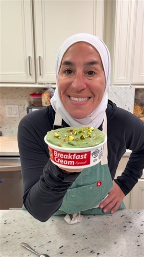 Easy Middle Eastern-Style Cheesecake (No-Bake Hack) 🍰 Ingredients: • 1 container Karoun breakfast cream or Karoun Laban • Arabic tea biscuits •. Pistachio pace or butter Instructions: 1. Open the container. 2. (Add a spoon or two of pistachio paste or pistachio butter spread and mix well. 3. Add the tea biscuits cookies on top or mix them in. Pour some of the pistachio paste right on top. 4. Cover and refrigerate for 12–24 hours so the cookies soften and create a cake-like texture. 5. Remove fr