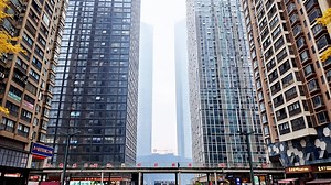 Tall buildings use elevated paths for access: China