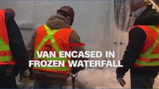Van encased in frozen waterfall