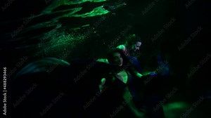 water-nymphs inside water of magical sea or lake, ancient mysterious myth and legend