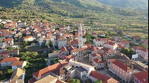 Jelsa, Hvar, Croatia - Aerial View Of The Coastal Town, Croatia. Captivating Drone Footage Of Jelsa On Hvar Island, Croatia, Highlighting The Entire Town Surrounded By The Adriatic Sea In The Summer