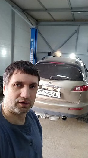 Infiniti FX50 Maintenance in Garage: Oil Change Process