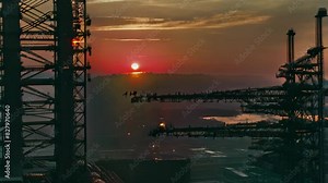 Sun Setting Over Large Construction Site