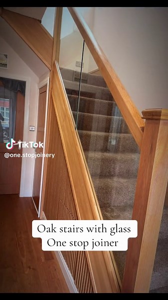 Oak stairs with glass | One Stop Joiner Manchester