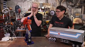 3.2K views · 139 reactions | NEW! We unbox and check out Robosen's Optimus Prime robot, which actually transforms between his iconic vehicle and robot modes with voice commands. The auto-converting Optmus Prime impresses Adam and Norm with its stability and range of motion, and we dive into some user-generated animations that stress the limits of its movement! https://youtu.be/ytI929g4puE | Tested | Facebook