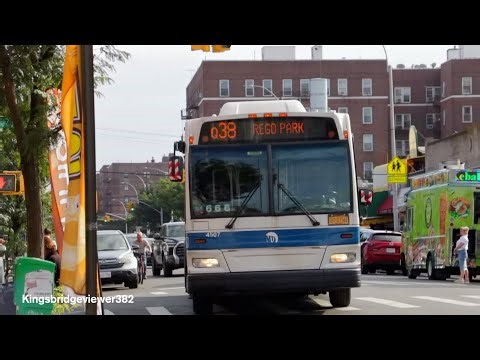 A Former MTA Bus Co Route Using a Former MTA Bus Co Hybrid Bus in Rego Park.