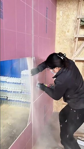 Precision Cutting Expertly Shaping Pink Foam Board for a Perfect Fit