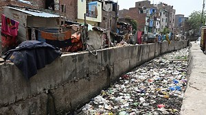 India’s cities struggle with sewage and waste as population grows