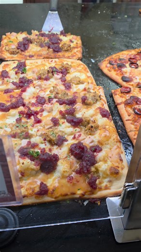 Eating an entire Thanksgiving dinner on a single slice of pizza | Exploring with Josh