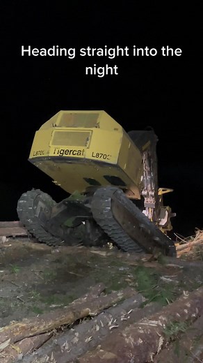 Buncher heading off the road just after midnight. #logging #loggingislife #fellerbuncher #springlogging #tigercat #nightshift #bluecollar