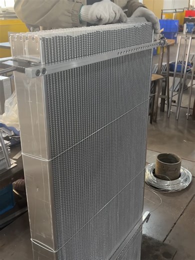 Inside Our Factory: Generator Radiator Main Plate Installation #GeneratorRadiator #RadiatorAssembly #OEMManufacturer #RadiatorFactory #IndustrialRadiator