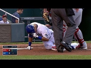 Aoki gets hit in the head on a throw back to the mound