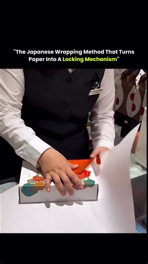 @lumathink on Instagram: "This Japanese gift-wrapping technique shows how precision can replace excess. Instead of covering a package with layers of tape, the wrapper relies on exact folds, controlled tension, and clean geometry to lock the paper in place. Each crease redirects force so the paper grips itself, creating friction and structural stability with just a single piece of tape. The result is a package that stays sealed, looks elegant, and produces less waste. What appears effortless is a