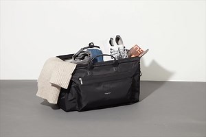 Planning a getaway this Memorial Day Weekend? Our Soho Duffel is the perfect duffel bag to take you there with ease. Features such as ample space for weekend essentials, interior organization and a built-in luggage handle sleeve make this the perfect bag for traveling near or far. #InTheBagg Shop Now: https://www.baggallini.com/soho-duffel/SDF707-BG-B1005-NS.html | baggallini