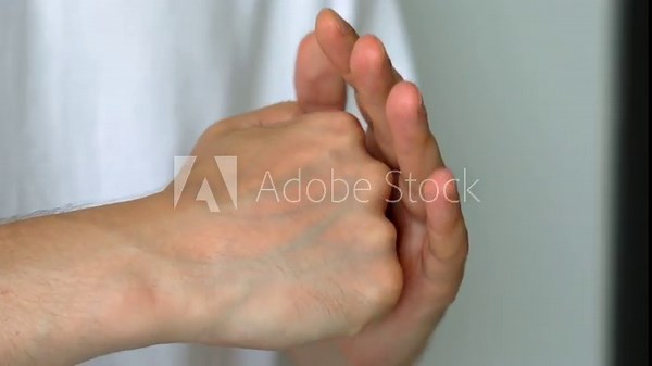 Clapping the palm of the hand. A symbol of aggression and anger. A man slaps his palm with his hand. An abuser threatens someone and wants to hit. A blow with the hand. A punch with a fist Stock Video