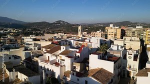 Calp, Alicante region, Spain - 28.12.2023 . Aerial footage of Calp old town in Spain, is a popular European summer vacation destination. Colourful narrow streets and painted houses.
