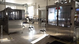 Production of table horseradish with beets. Processing horseradish into food seasoning. Horseradish seasoning production. Conveyor for packaging table horseradish with red beets into jars.